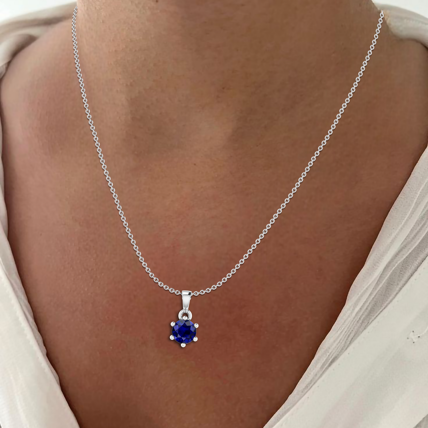 Classic Round Blue Sapphire Silver Solitaire Pendant - View 2