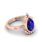 Enchanting Blue Sapphire Pear Halo Rose Gold Plated Ring