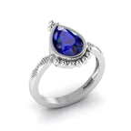 Enchanting Blue Sapphire Pear Halo Silver Ring