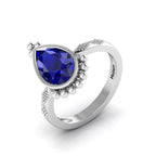 Enchanting Blue Sapphire Pear Halo Silver Ring