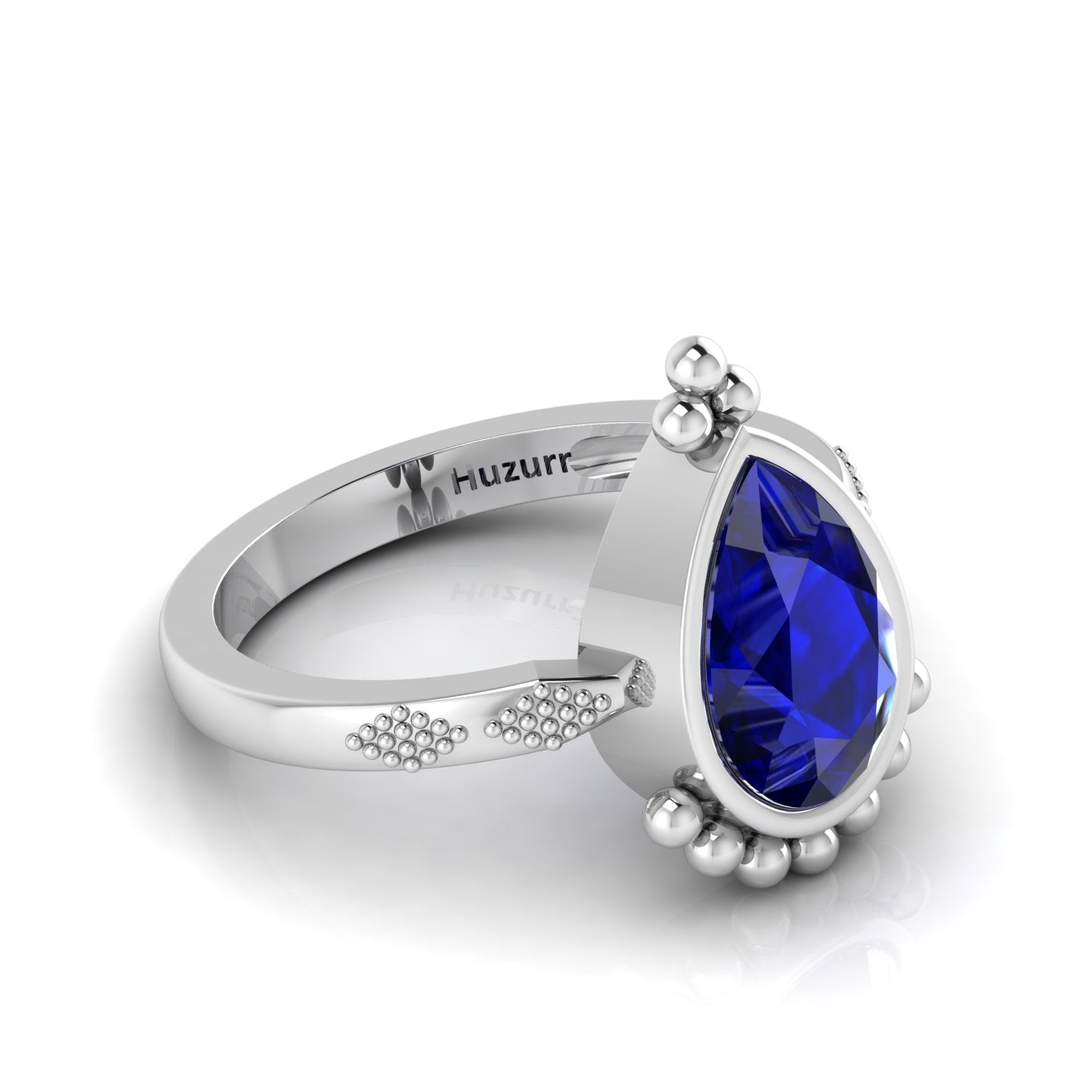 Enchanting Blue Sapphire Pear Halo Silver Ring
